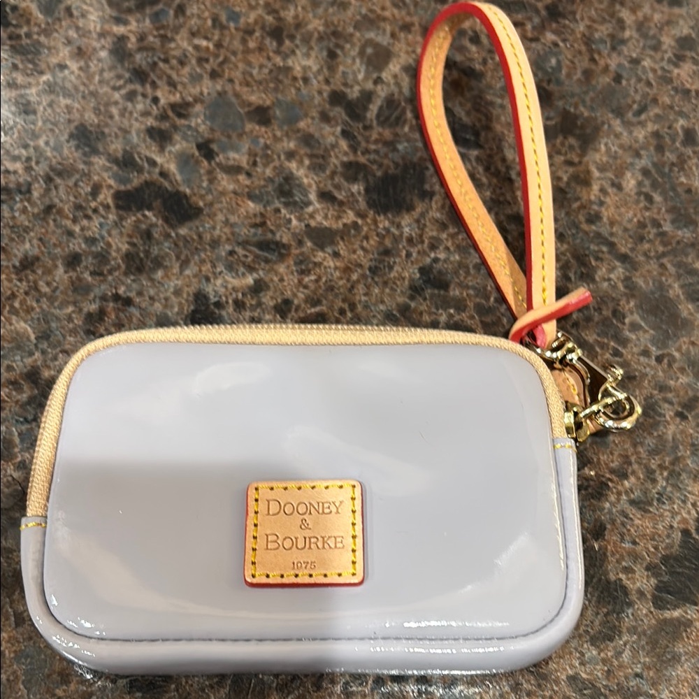 Dooney & Bourke Light Gray Wristlet with camel leather and red trimming